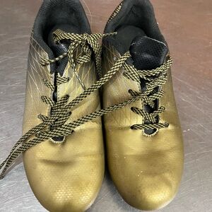 Gold and Black Athletic Shoes